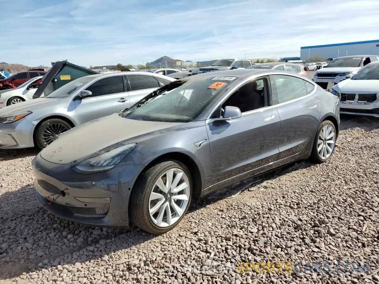 1 Photograph of a damaged car 5YJ3E1EB6LF638063 TESLA MODEL 3 2020