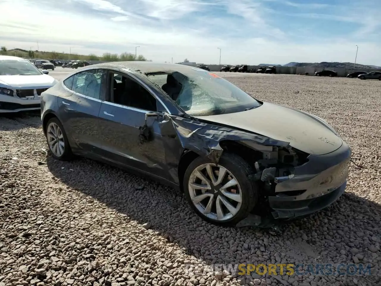 4 Photograph of a damaged car 5YJ3E1EB6LF638063 TESLA MODEL 3 2020