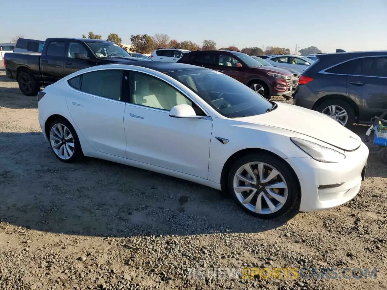 4 Photograph of a damaged car 5YJ3E1EB8LF622950 TESLA MODEL 3 2020