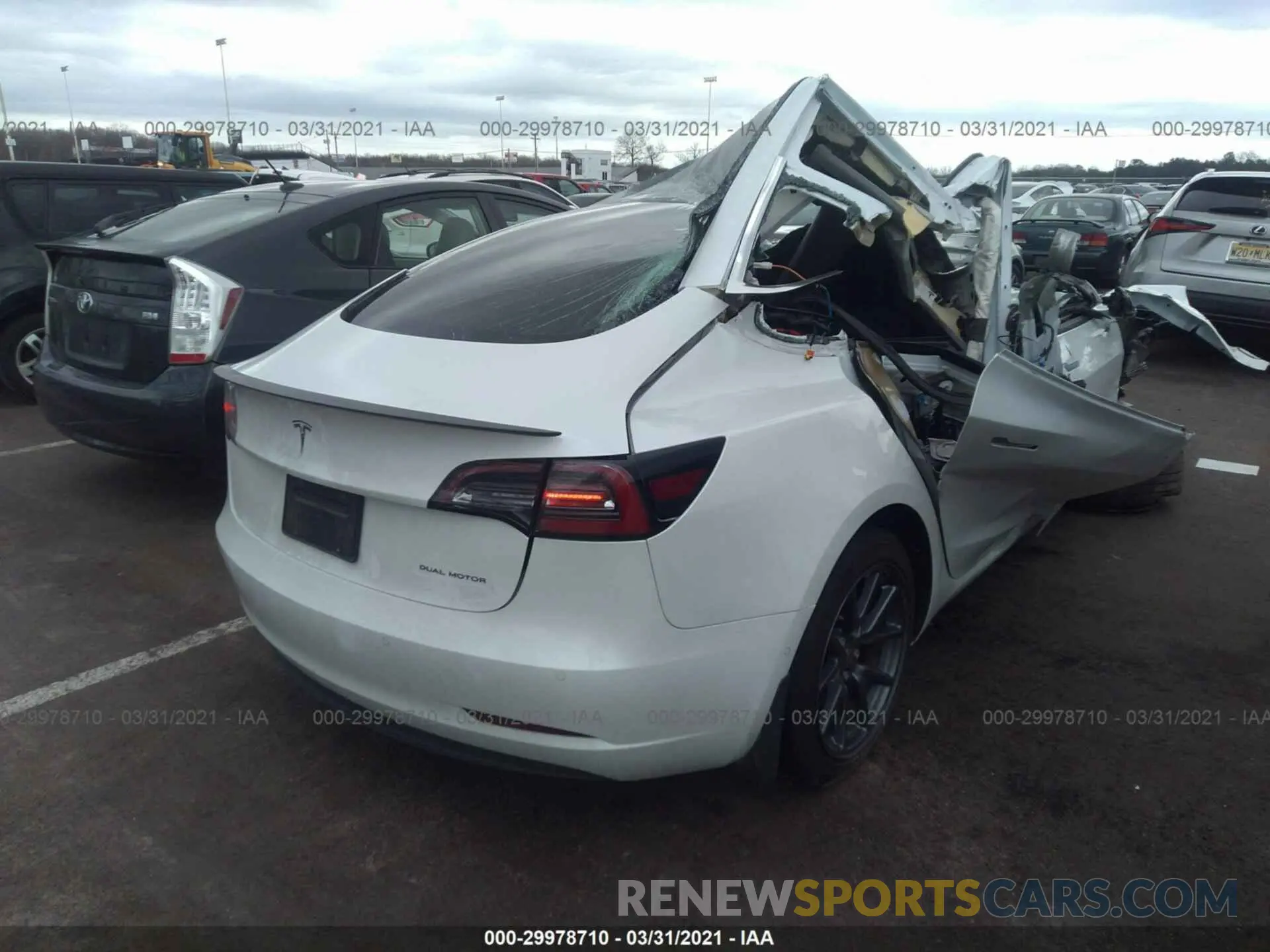 4 Photograph of a damaged car 5YJ3E1EB8LF665006 TESLA MODEL 3 2020