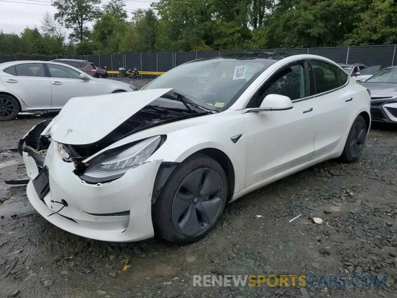 1 Photograph of a damaged car 5YJ3E1EB9LF618132 TESLA MODEL 3 2020