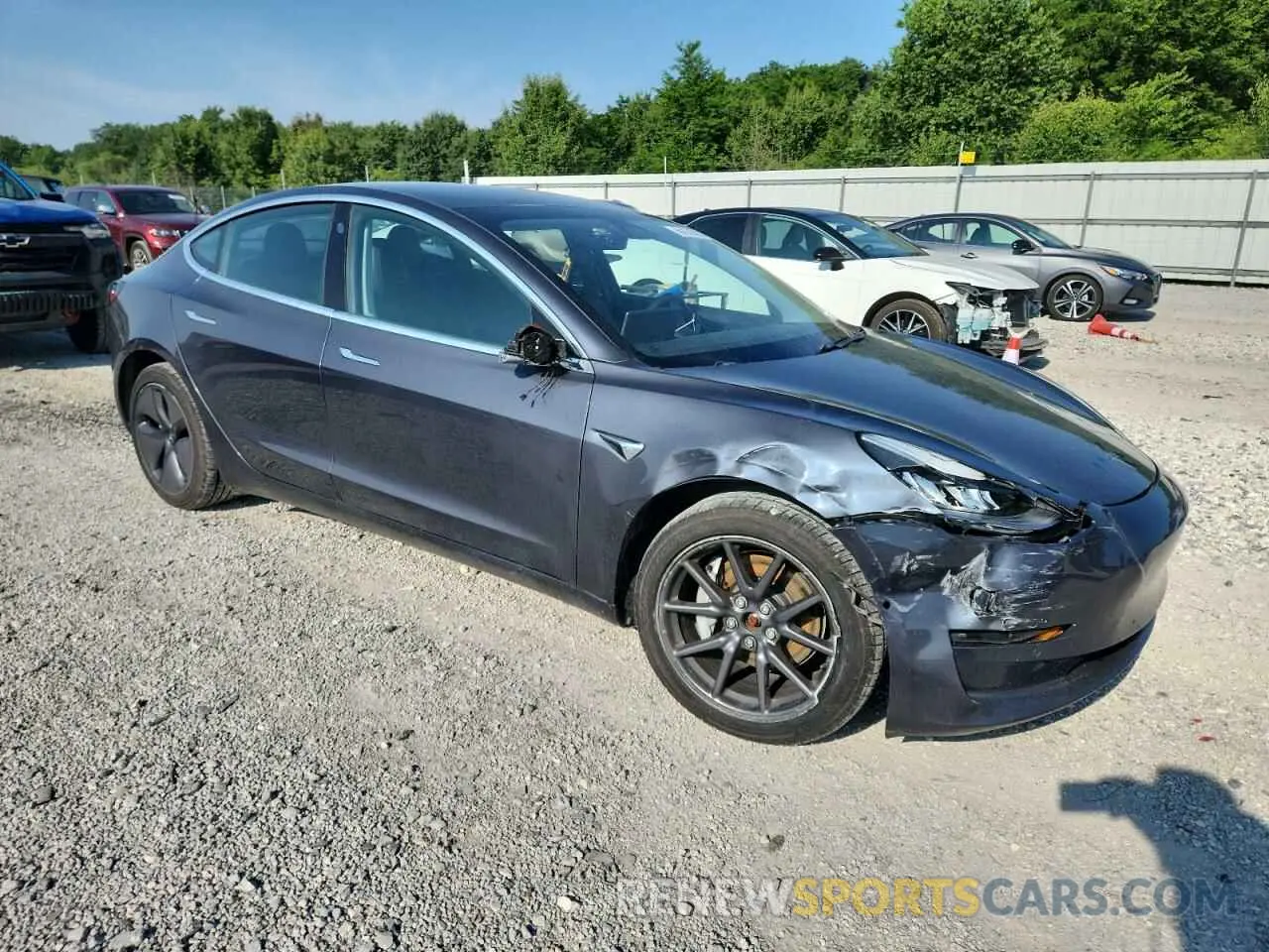 4 Photograph of a damaged car 5YJ3E1EB9LF635402 TESLA MODEL 3 2020