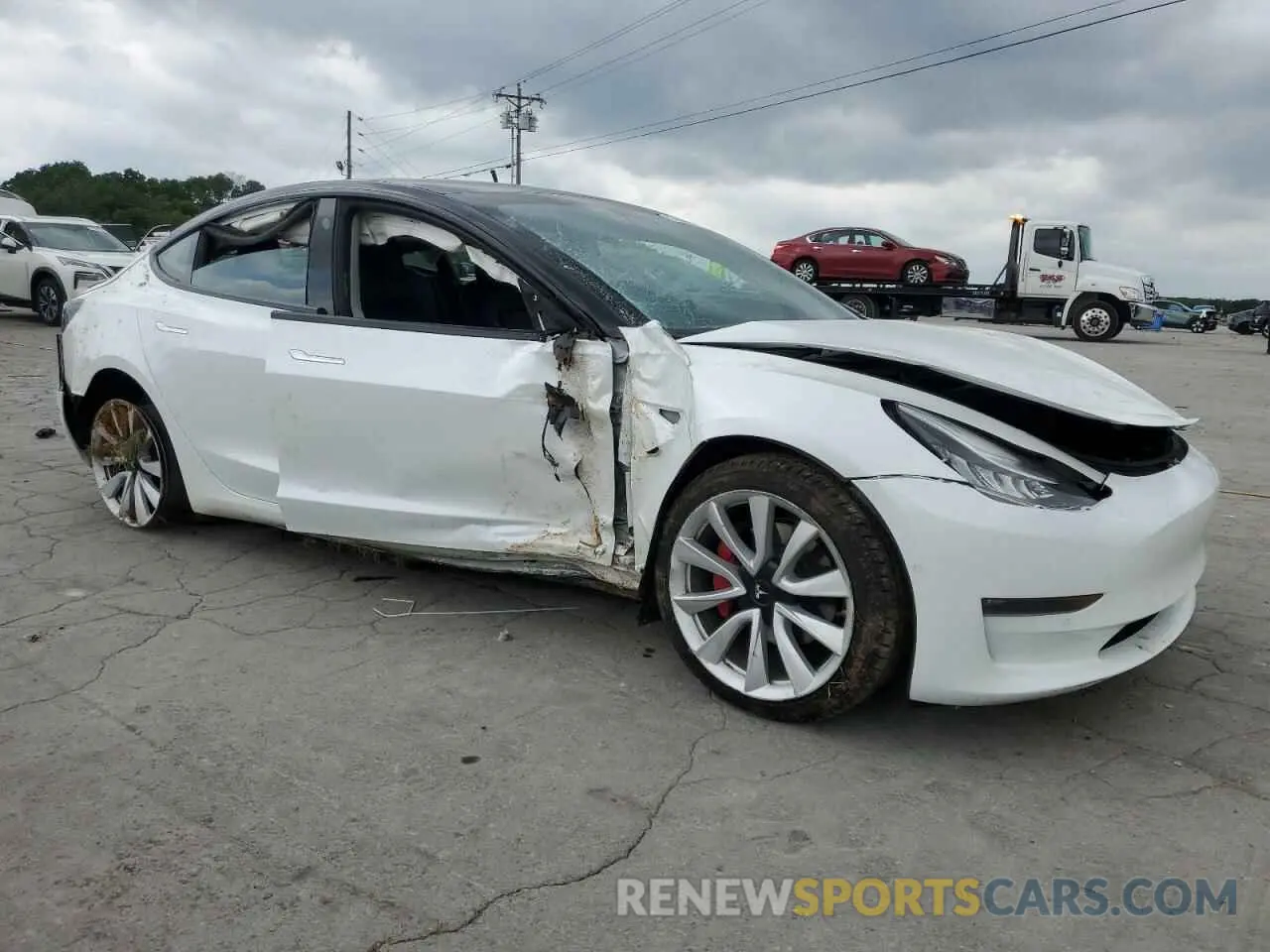 4 Photograph of a damaged car 5YJ3E1EB9LF667394 TESLA MODEL 3 2020