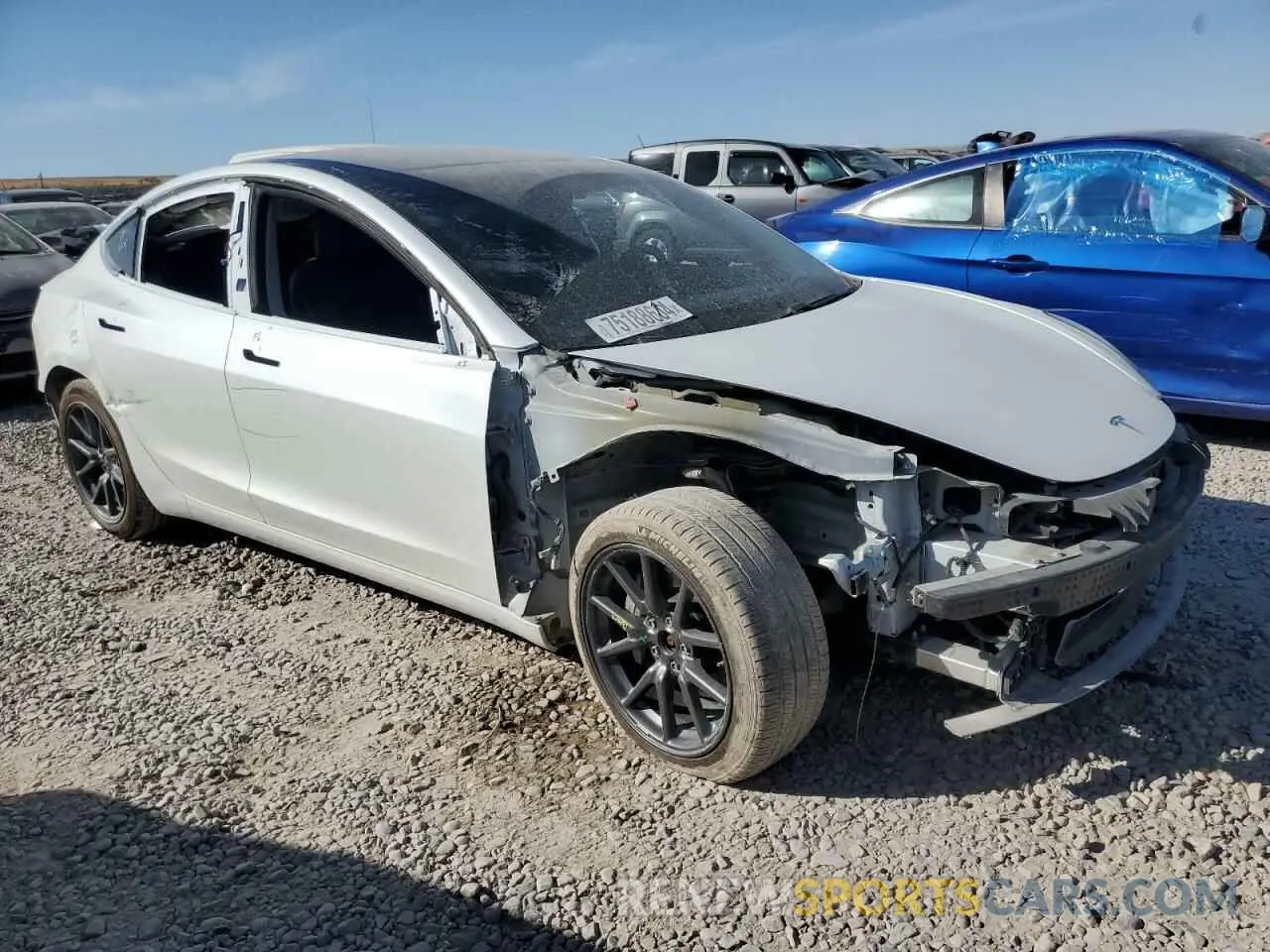 4 Photograph of a damaged car 5YJ3E1EB9LF735189 TESLA MODEL 3 2020