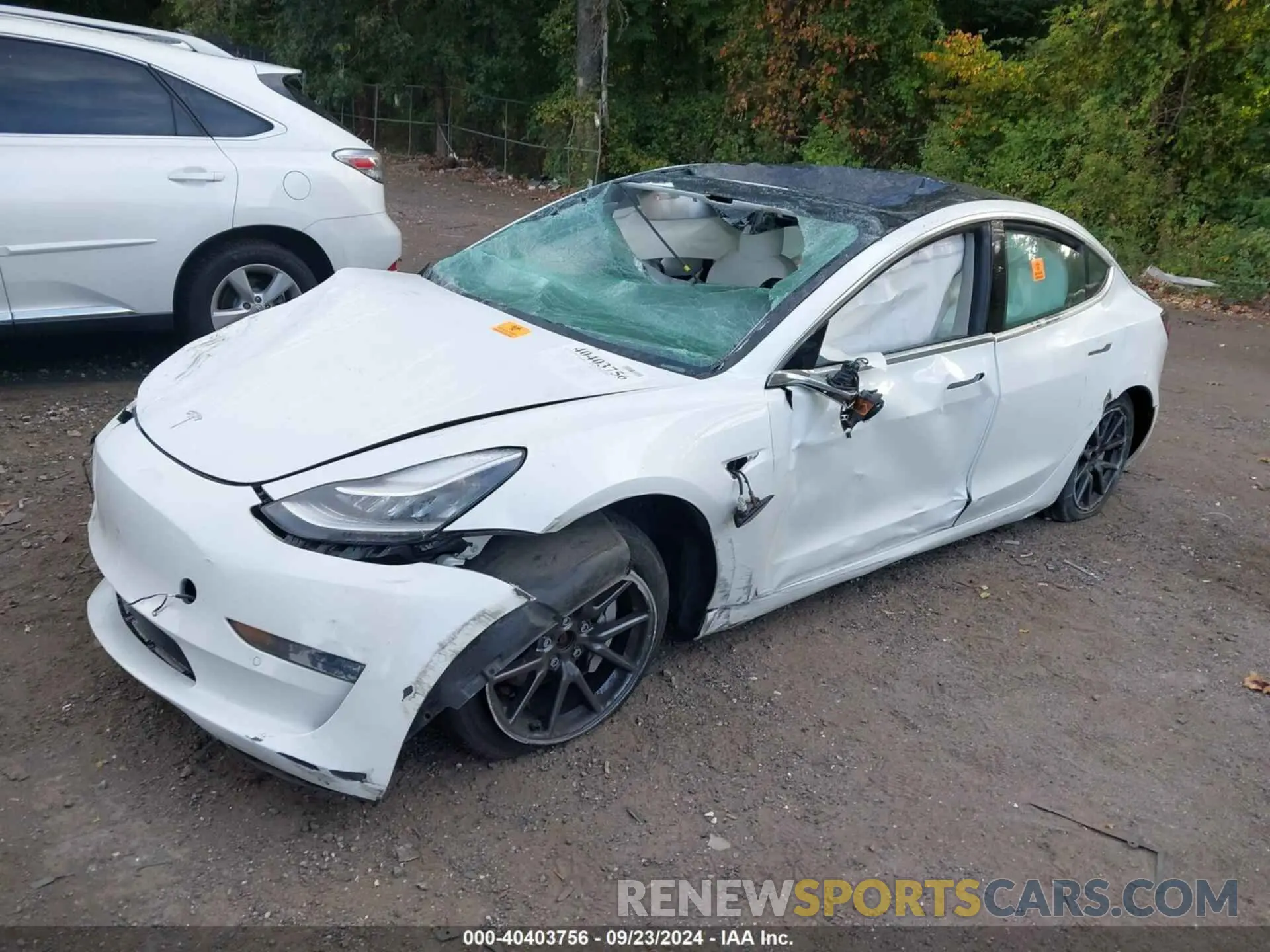 2 Photograph of a damaged car 5YJ3E1EB9LF744717 TESLA MODEL 3 2020
