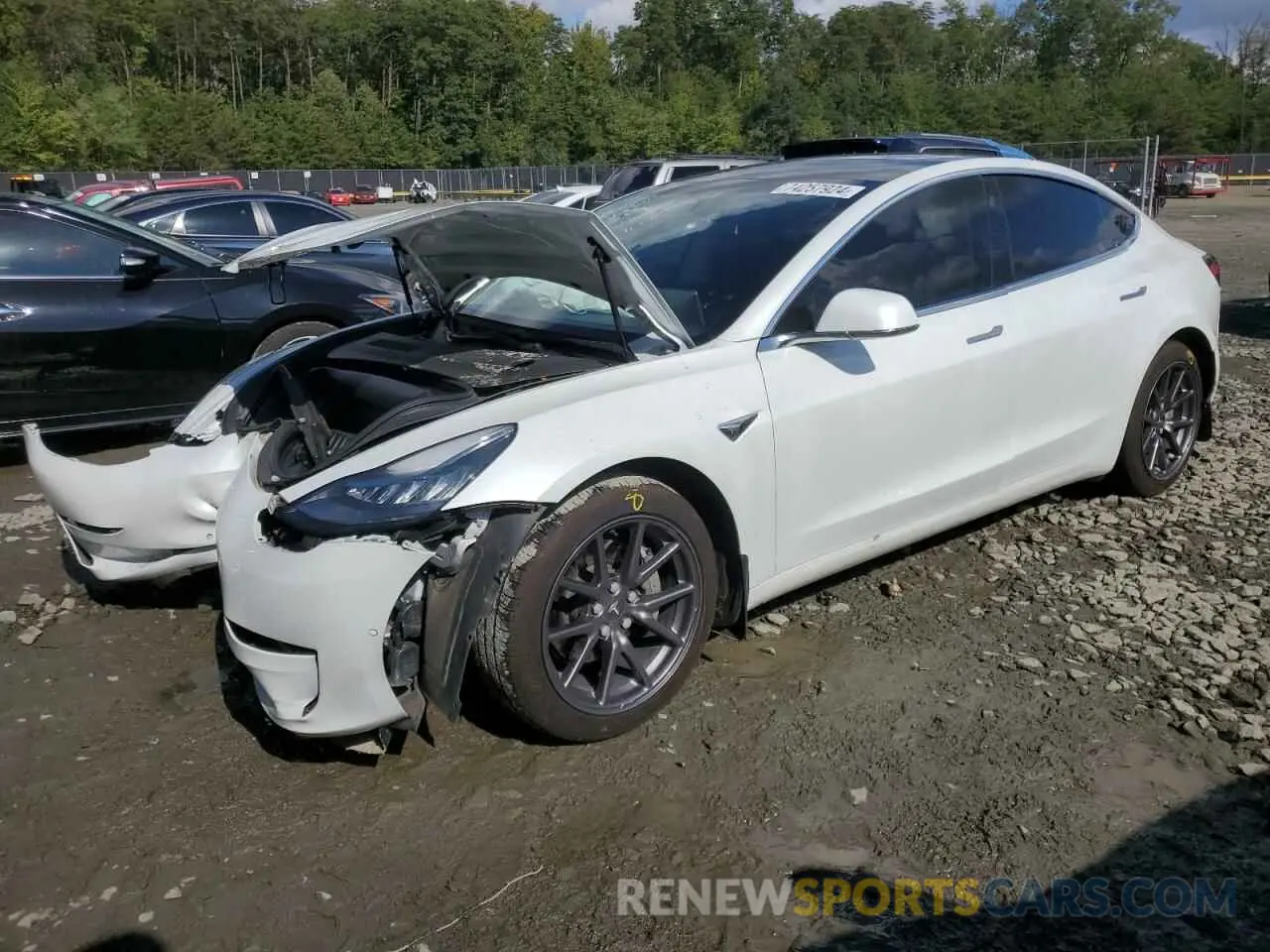 1 Photograph of a damaged car 5YJ3E1EB9LF795084 TESLA MODEL 3 2020