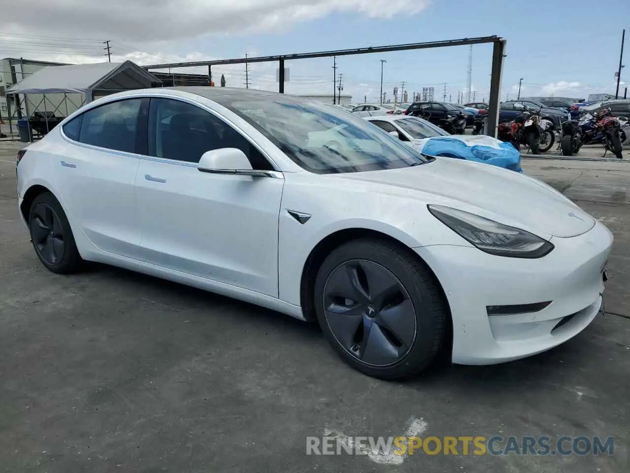 4 Photograph of a damaged car 5YJ3E1EBXLF665895 TESLA MODEL 3 2020