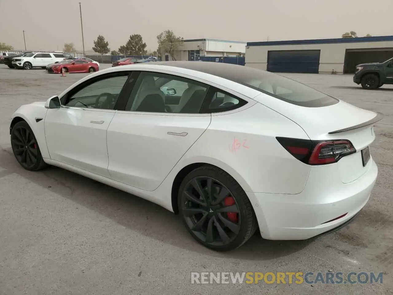 2 Photograph of a damaged car 5YJ3E1EC4LF642024 TESLA MODEL 3 2020