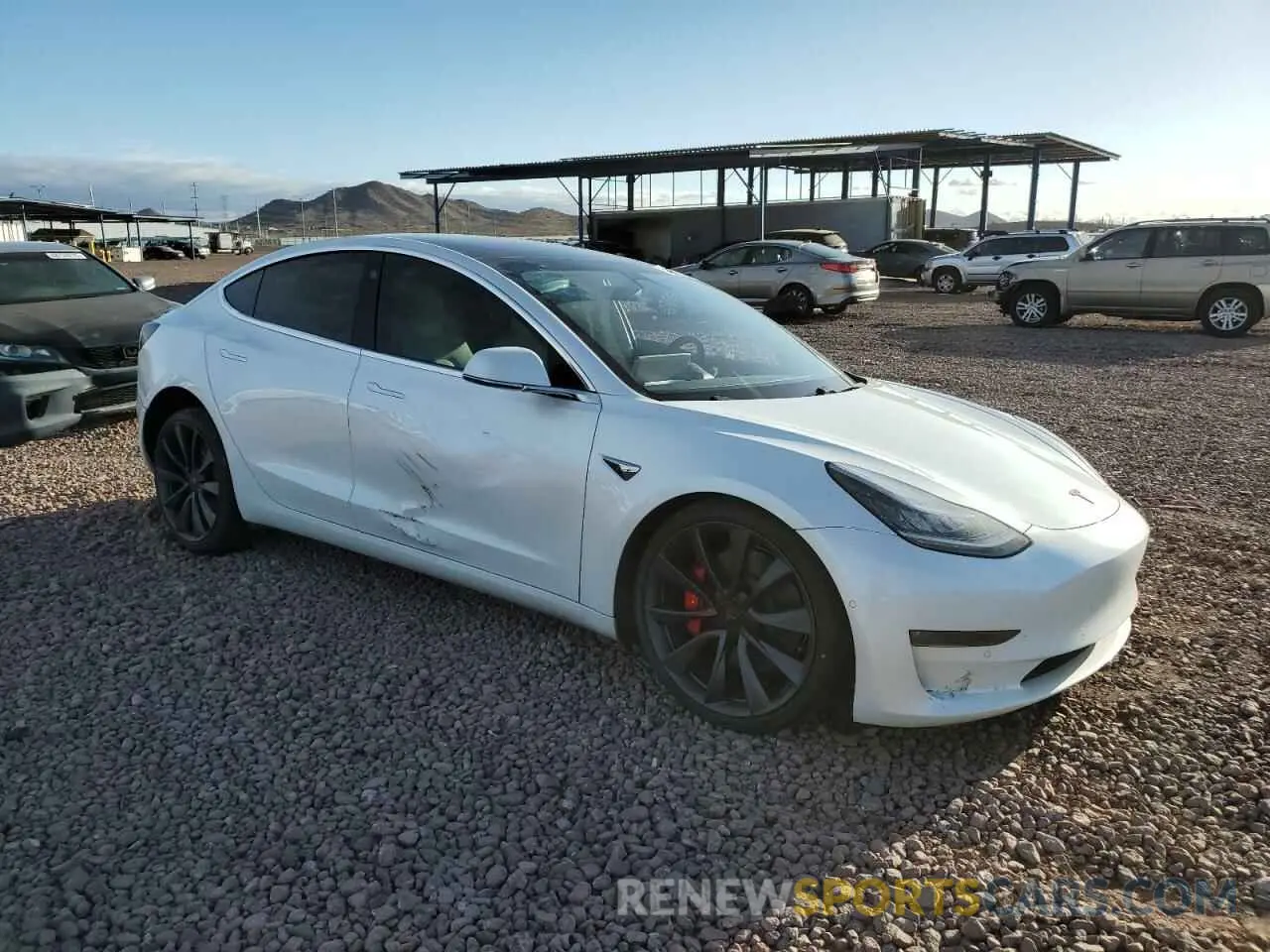 4 Photograph of a damaged car 5YJ3E1EC5LF624809 TESLA MODEL 3 2020
