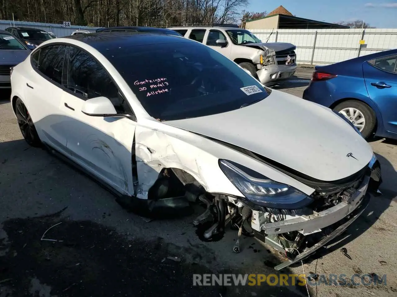 4 Photograph of a damaged car 5YJ3E1EC5LF731973 TESLA MODEL 3 2020