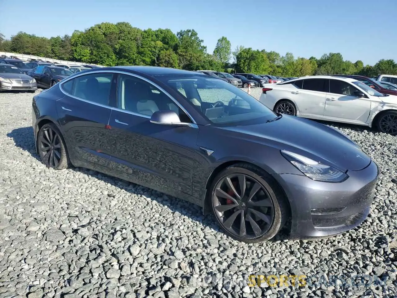 4 Photograph of a damaged car 5YJ3E1EC8LF623685 TESLA MODEL 3 2020