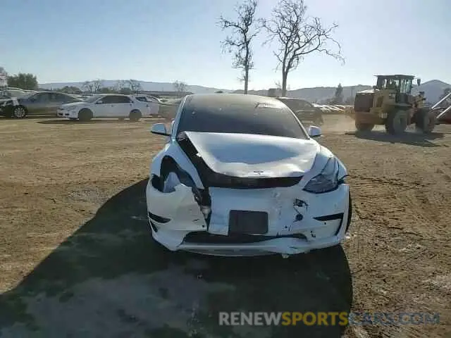 11 Photograph of a damaged car 5YJ3E1EA0MF017765 TESLA MODEL 3 2021