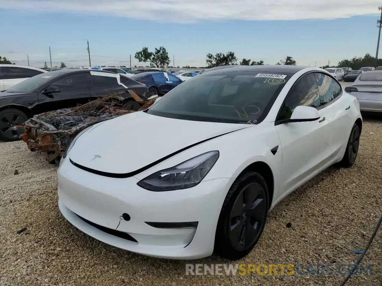 2 Photograph of a damaged car 5YJ3E1EA0MF062785 TESLA MODEL 3 2021