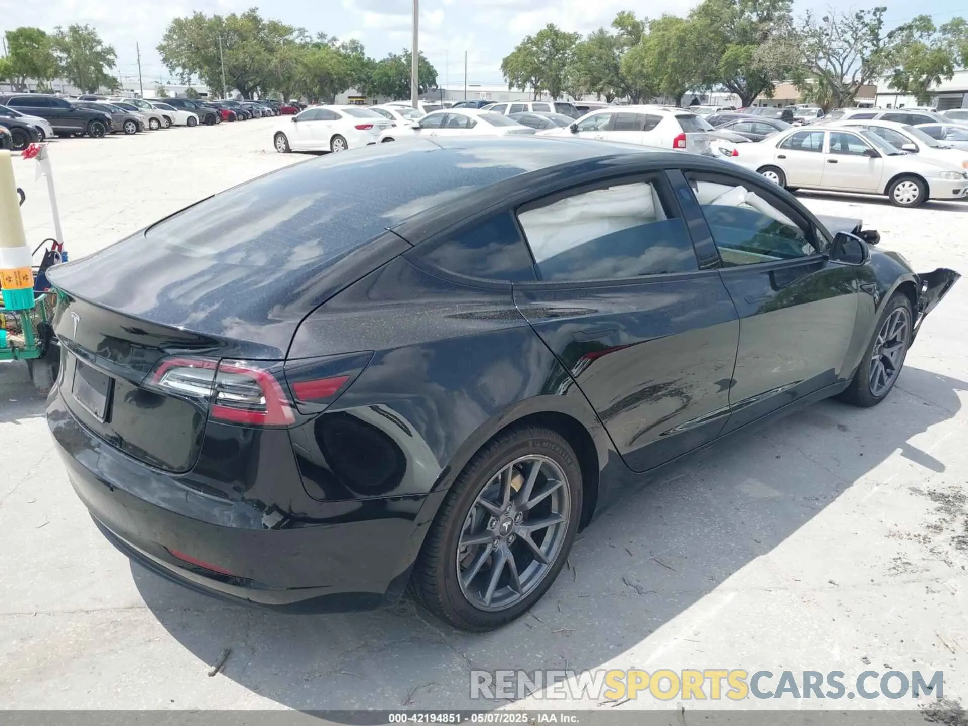 4 Photograph of a damaged car 5YJ3E1EA0MF851177 TESLA MODEL 3 2021