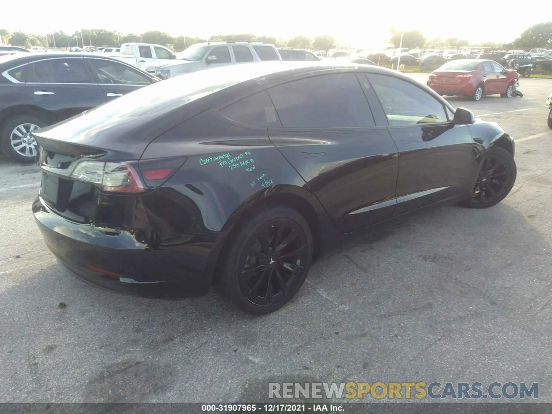 4 Photograph of a damaged car 5YJ3E1EA0MF851227 TESLA MODEL 3 2021
