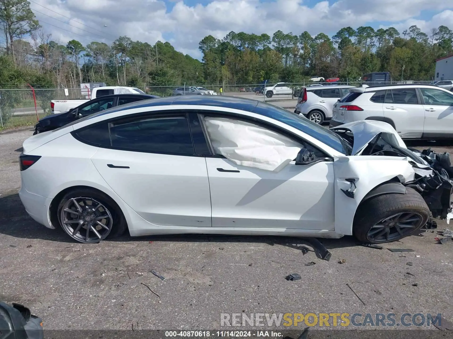 13 Photograph of a damaged car 5YJ3E1EA0MF907974 TESLA MODEL 3 2021