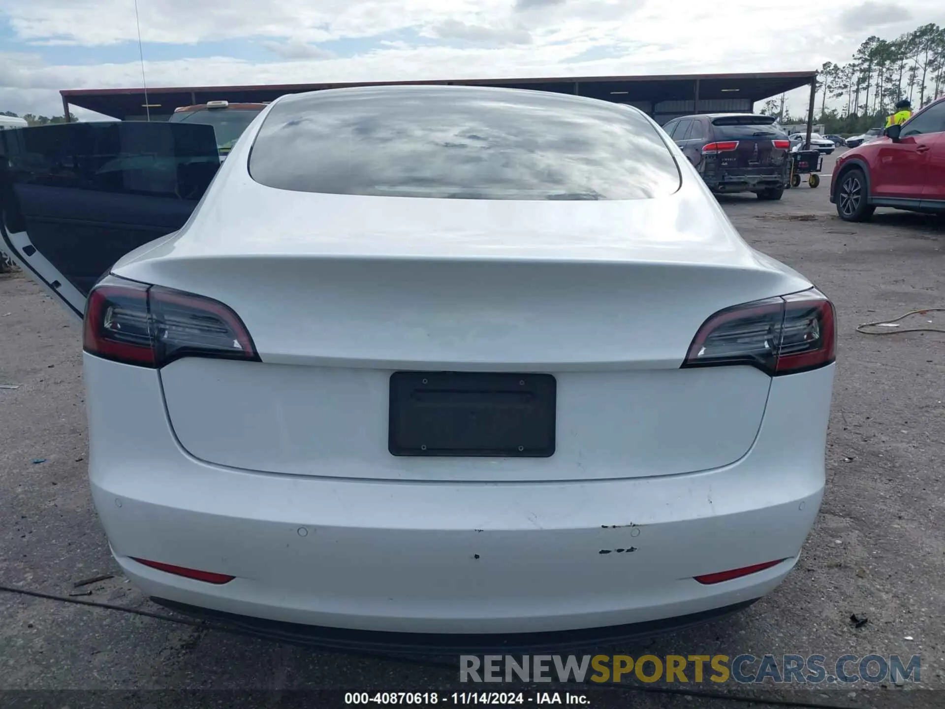 16 Photograph of a damaged car 5YJ3E1EA0MF907974 TESLA MODEL 3 2021