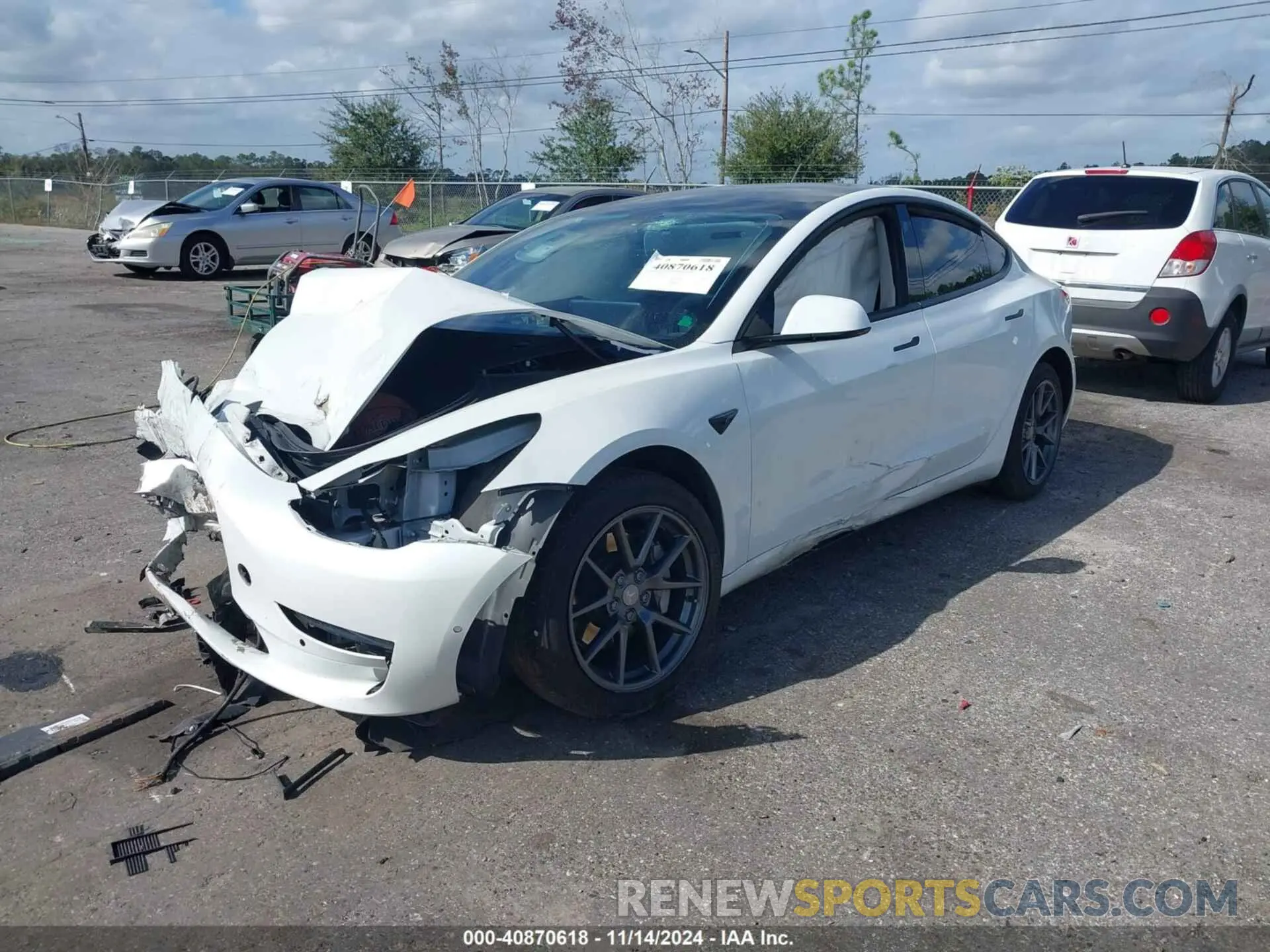 2 Photograph of a damaged car 5YJ3E1EA0MF907974 TESLA MODEL 3 2021