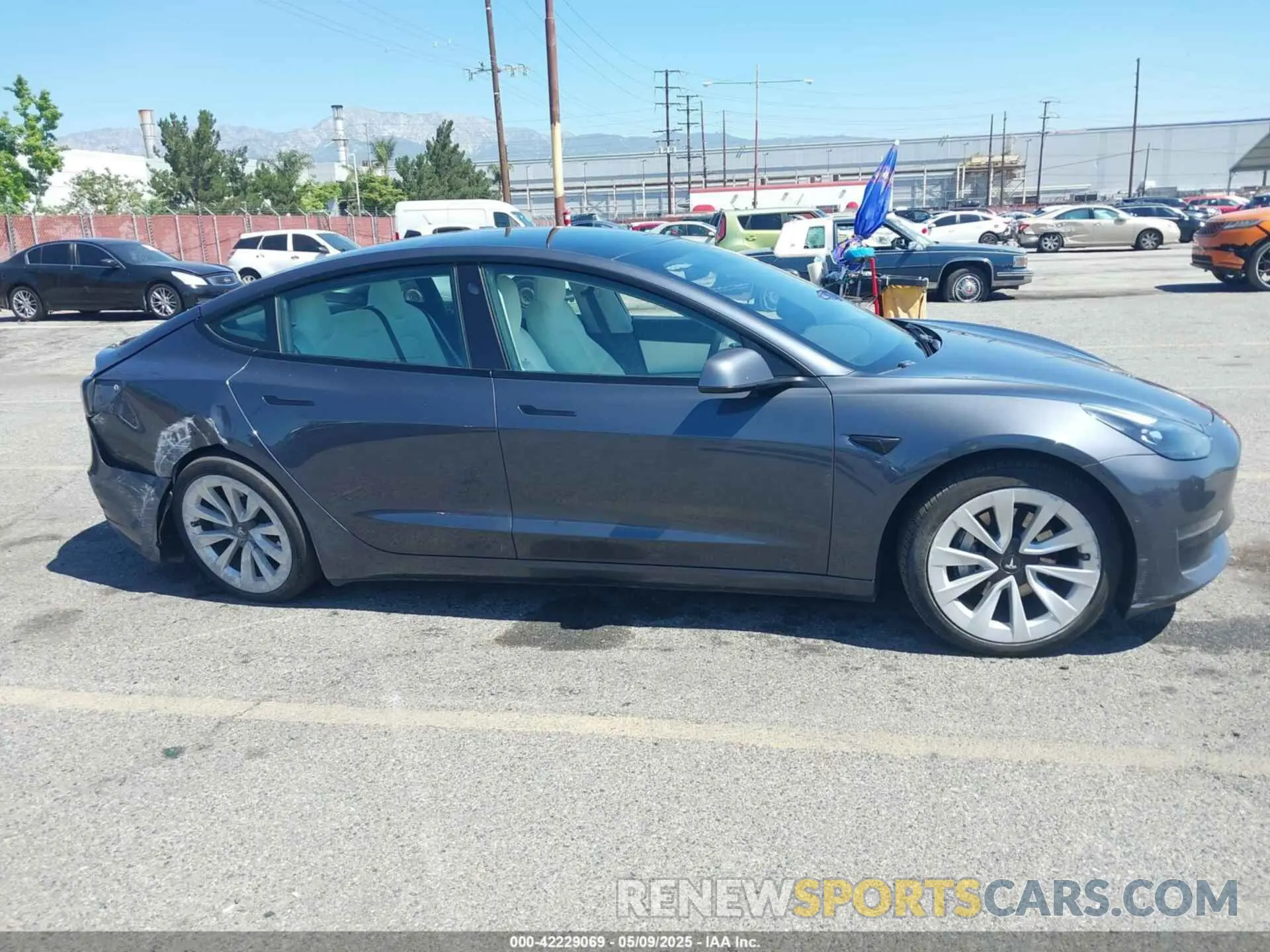 12 Фотография поврежденного автомобиля 5YJ3E1EA0MF908736 TESLA MODEL 3 2021