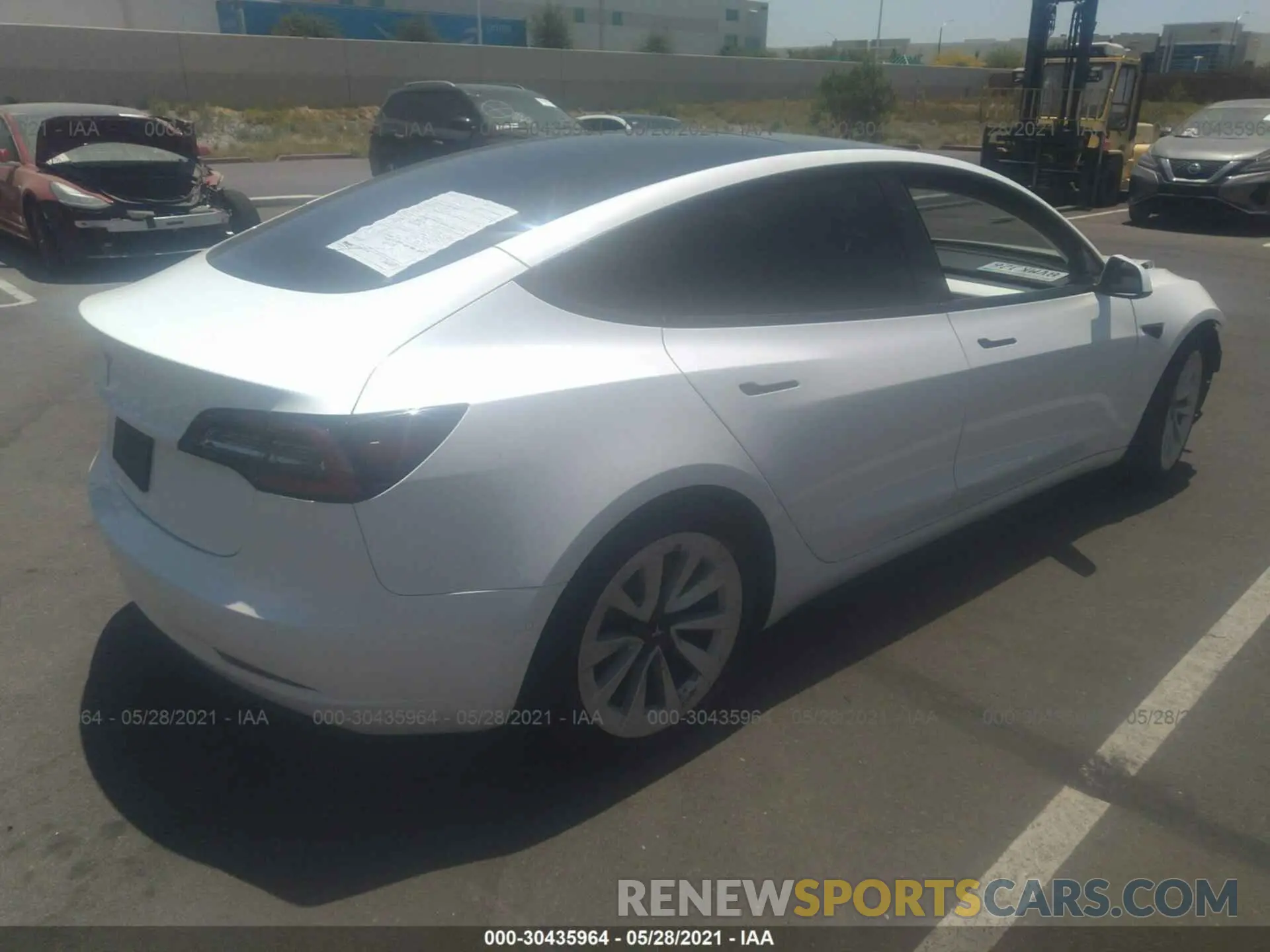 4 Photograph of a damaged car 5YJ3E1EA0MF927691 TESLA MODEL 3 2021