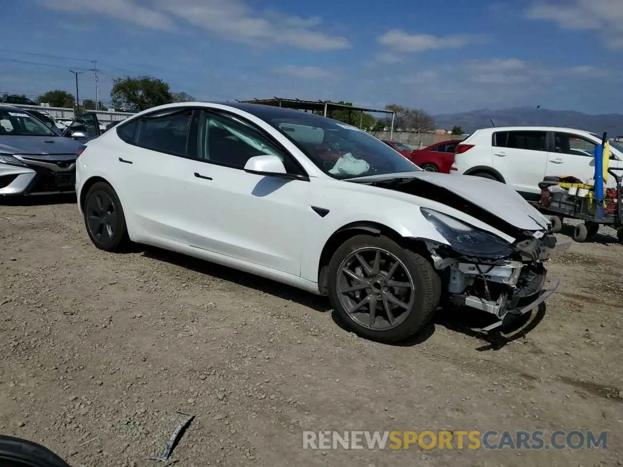 4 Photograph of a damaged car 5YJ3E1EA1MF871986 TESLA MODEL 3 2021