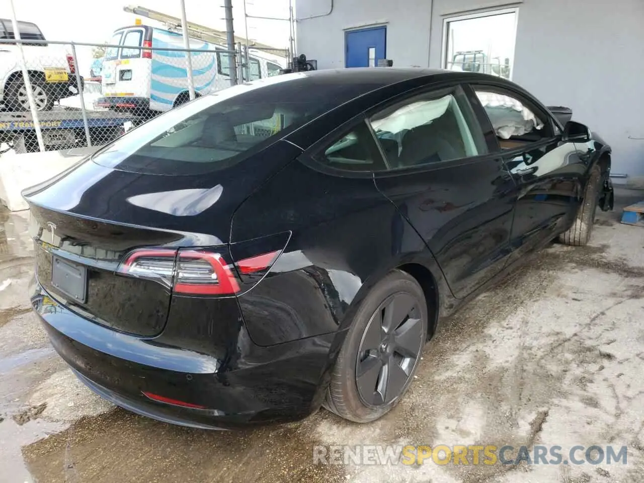 4 Photograph of a damaged car 5YJ3E1EA1MF992016 TESLA MODEL 3 2021