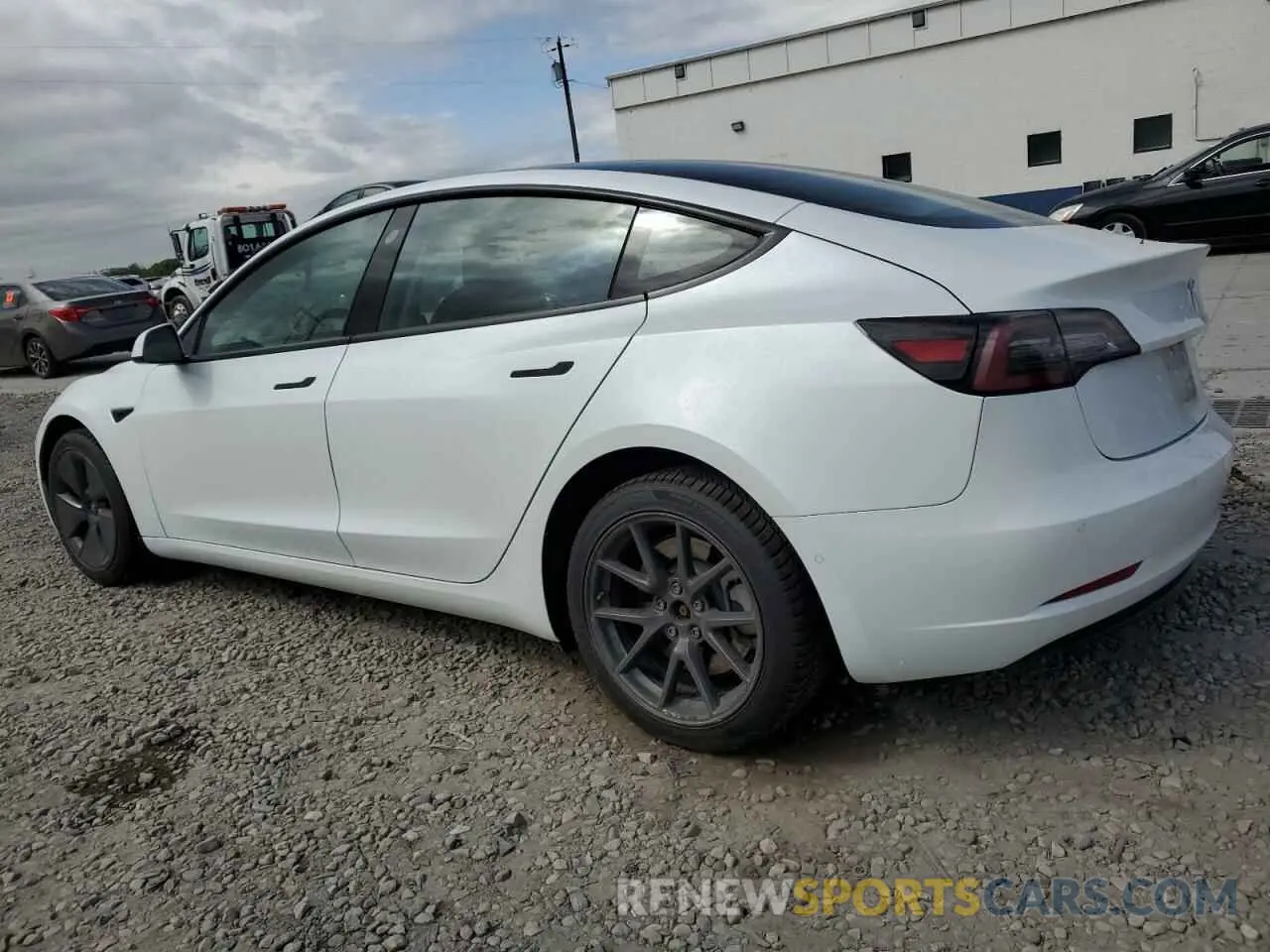 2 Photograph of a damaged car 5YJ3E1EA1MF997586 TESLA MODEL 3 2021