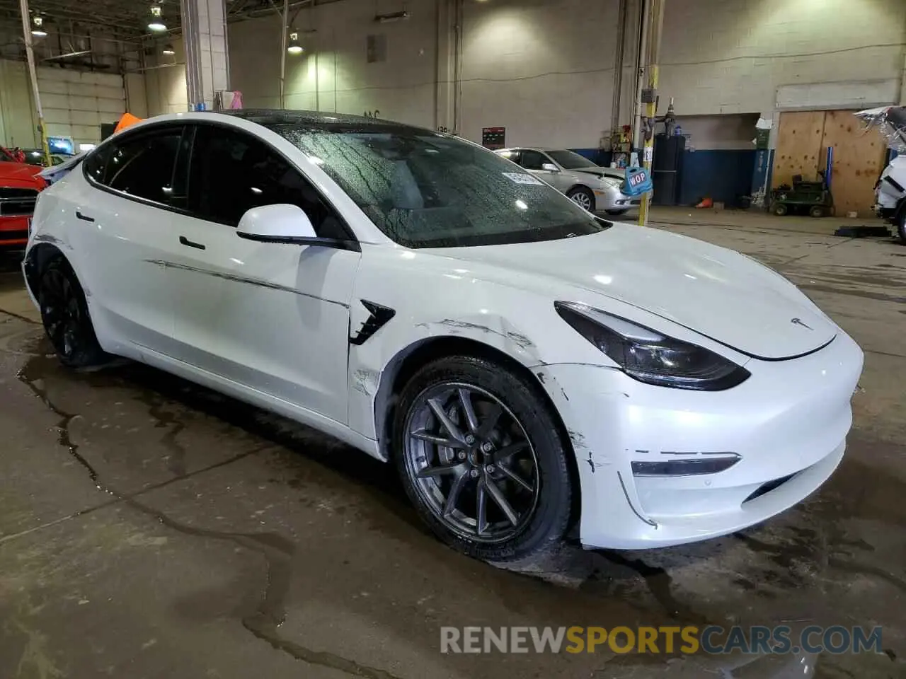 4 Photograph of a damaged car 5YJ3E1EA2MF058625 TESLA MODEL 3 2021