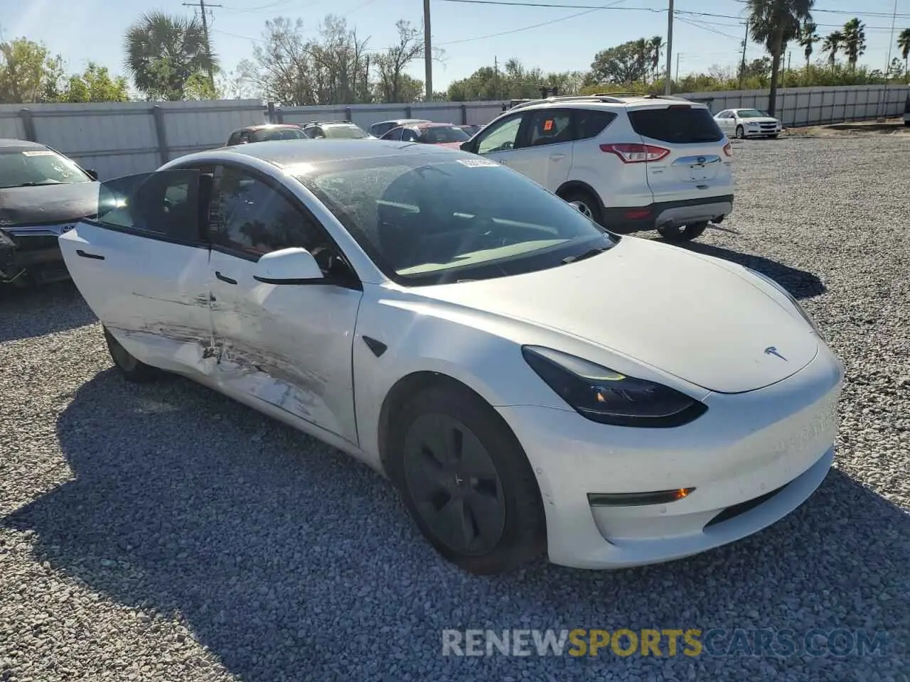 4 Photograph of a damaged car 5YJ3E1EA2MF095724 TESLA MODEL 3 2021