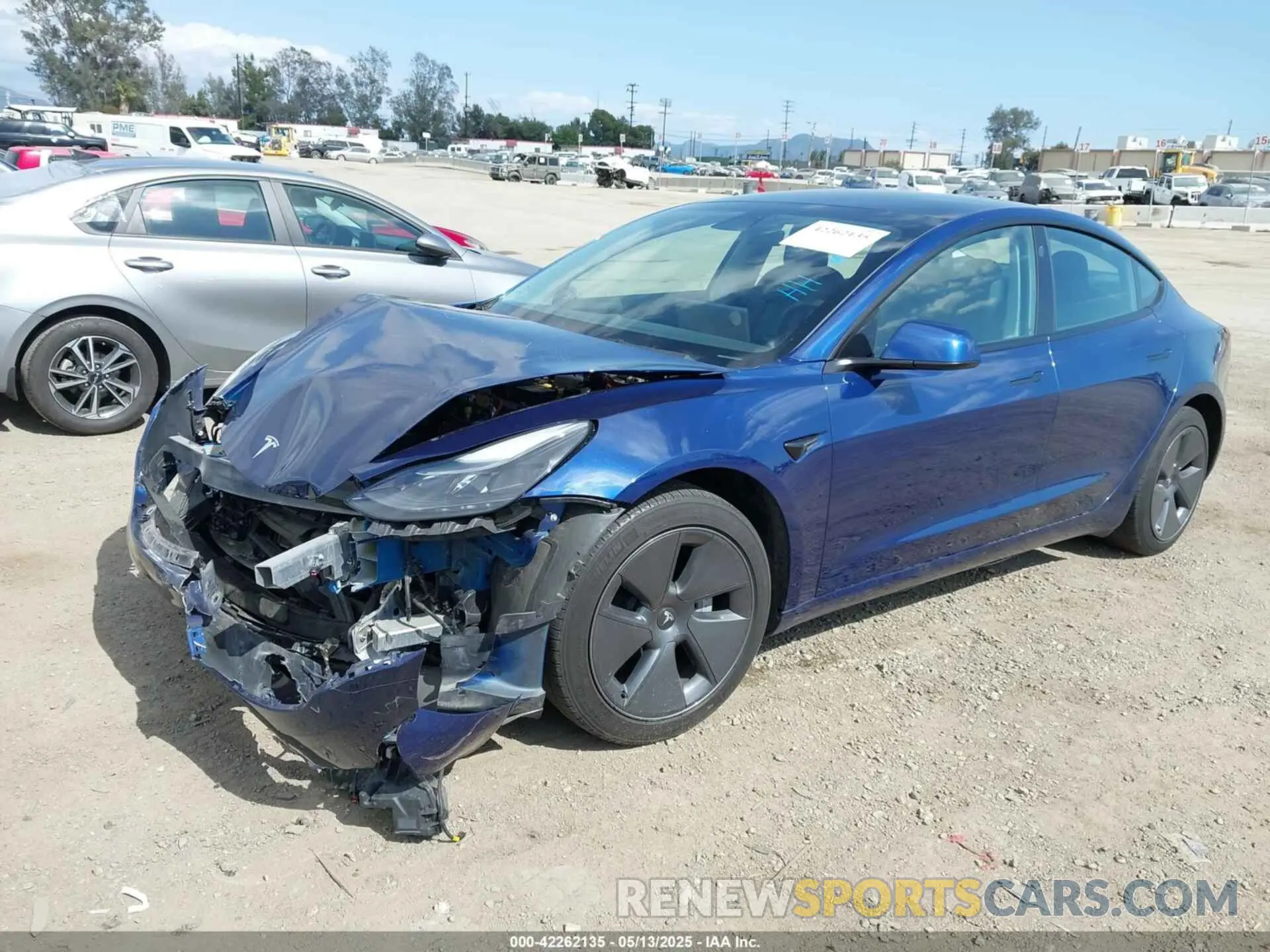 2 Photograph of a damaged car 5YJ3E1EA2MF098459 TESLA MODEL 3 2021