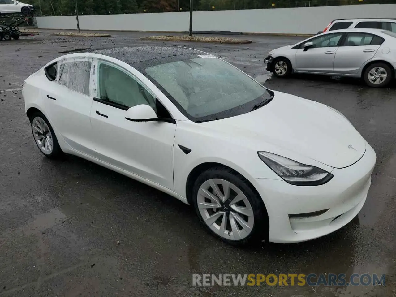 4 Photograph of a damaged car 5YJ3E1EA2MF853870 TESLA MODEL 3 2021