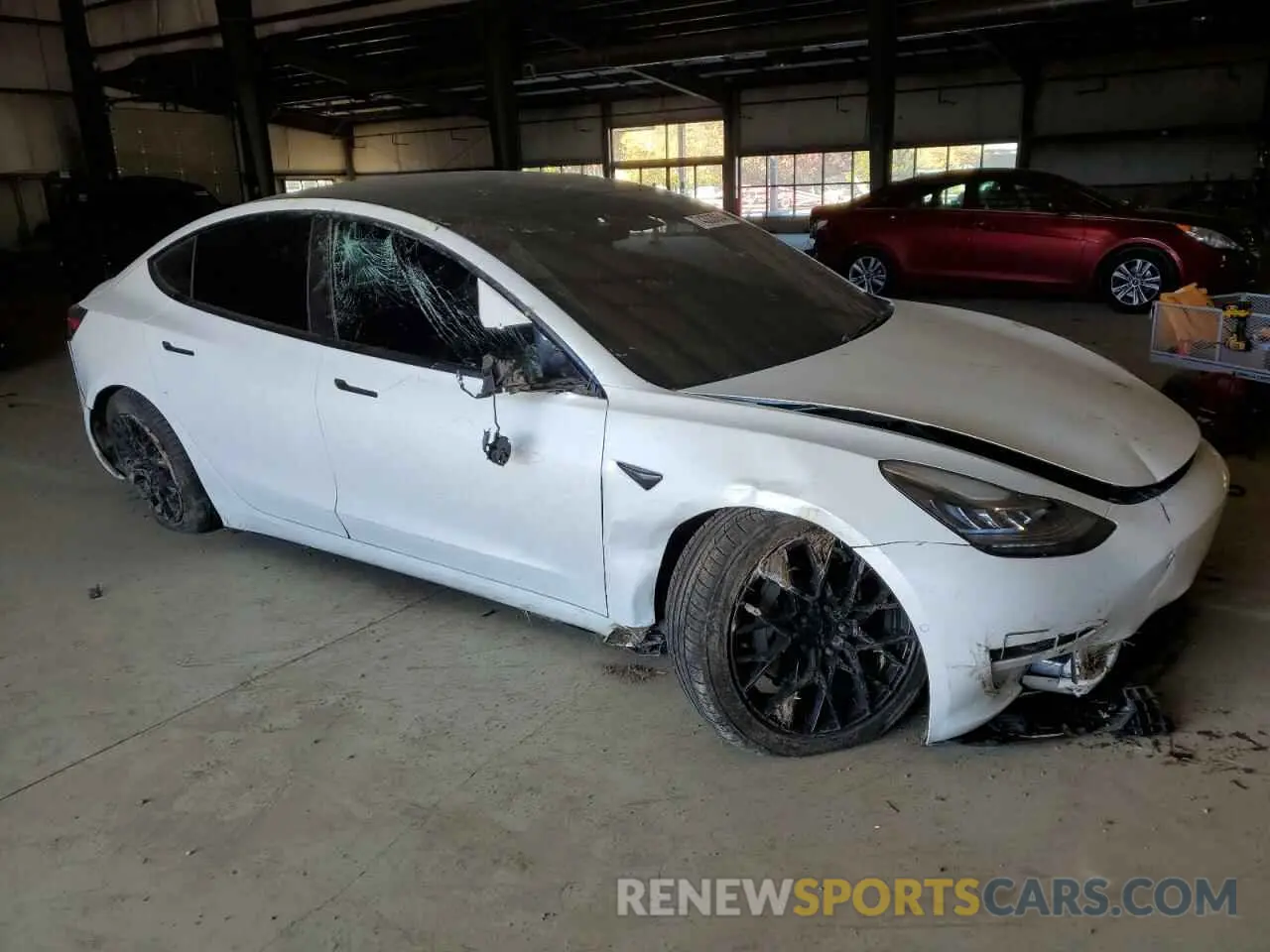 4 Photograph of a damaged car 5YJ3E1EA2MF859703 TESLA MODEL 3 2021