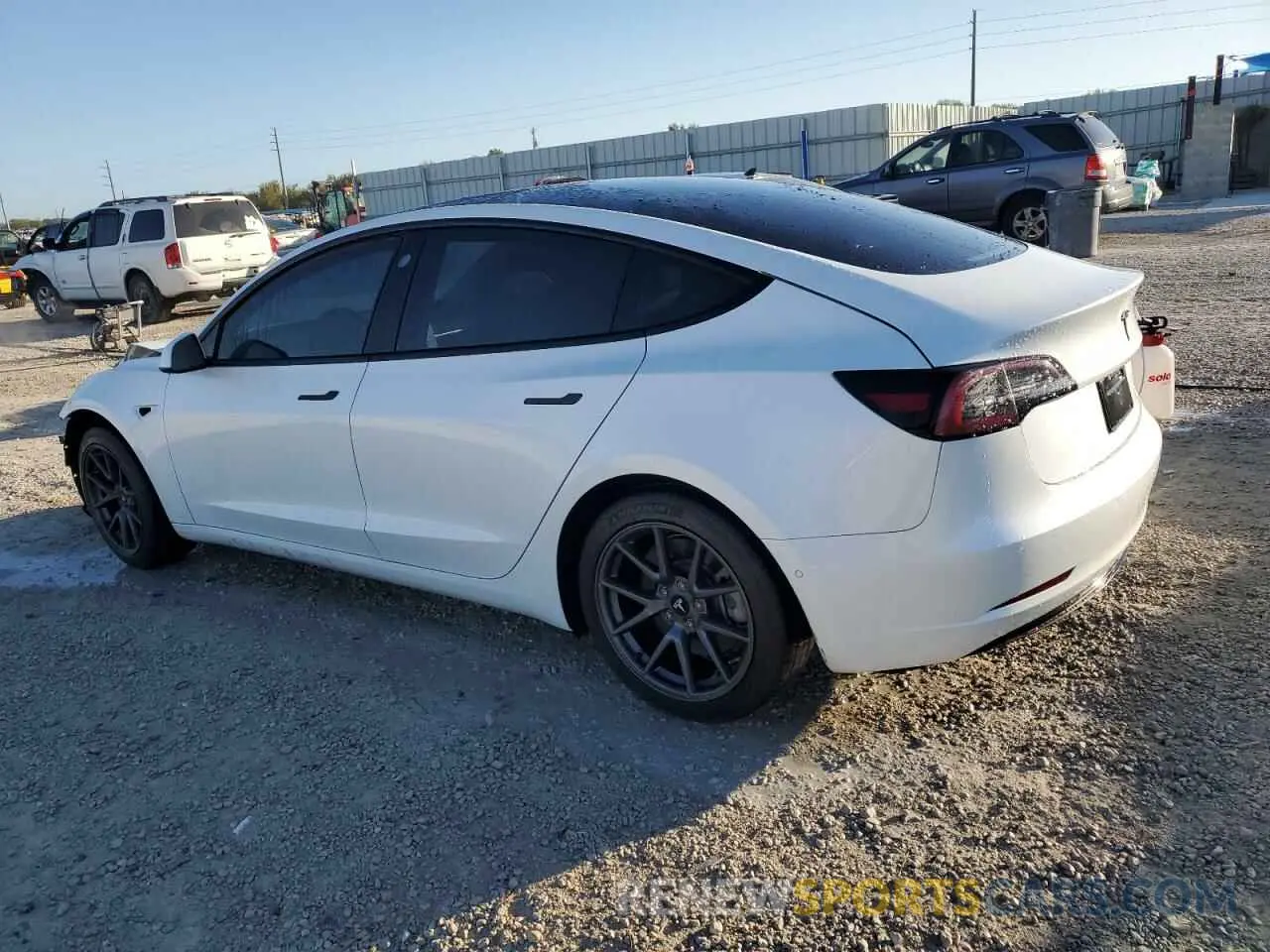 2 Photograph of a damaged car 5YJ3E1EA2MF868059 TESLA MODEL 3 2021
