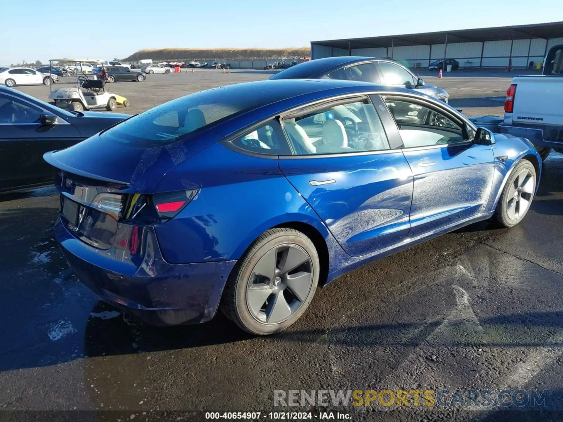 4 Photograph of a damaged car 5YJ3E1EA2MF938689 TESLA MODEL 3 2021