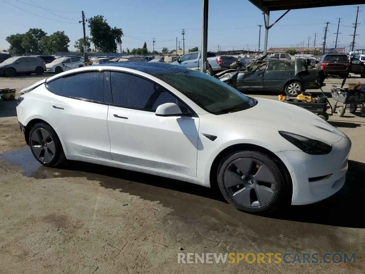 4 Photograph of a damaged car 5YJ3E1EA2MF997936 TESLA MODEL 3 2021