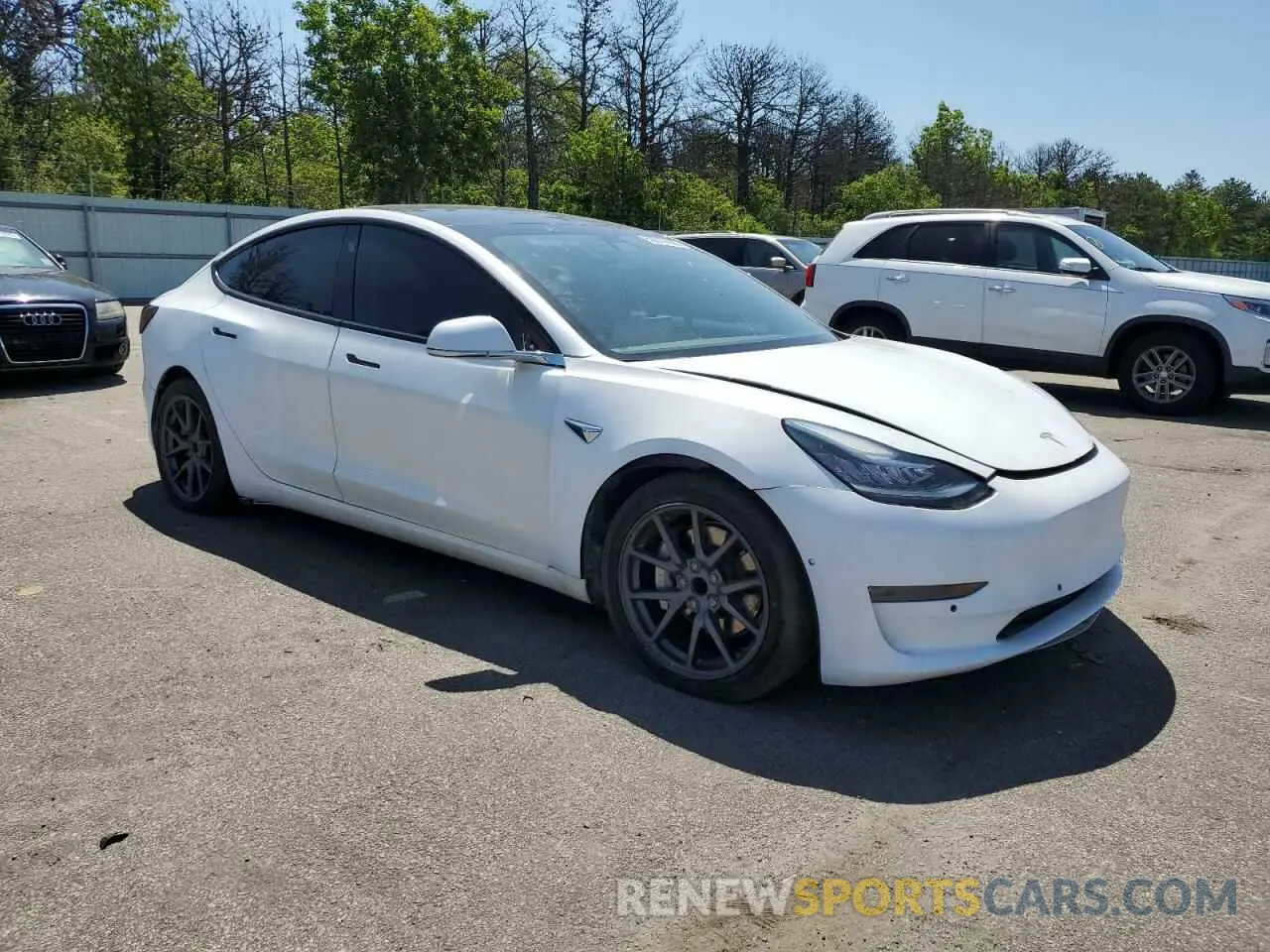 4 Photograph of a damaged car 5YJ3E1EA3MF027335 TESLA MODEL 3 2021