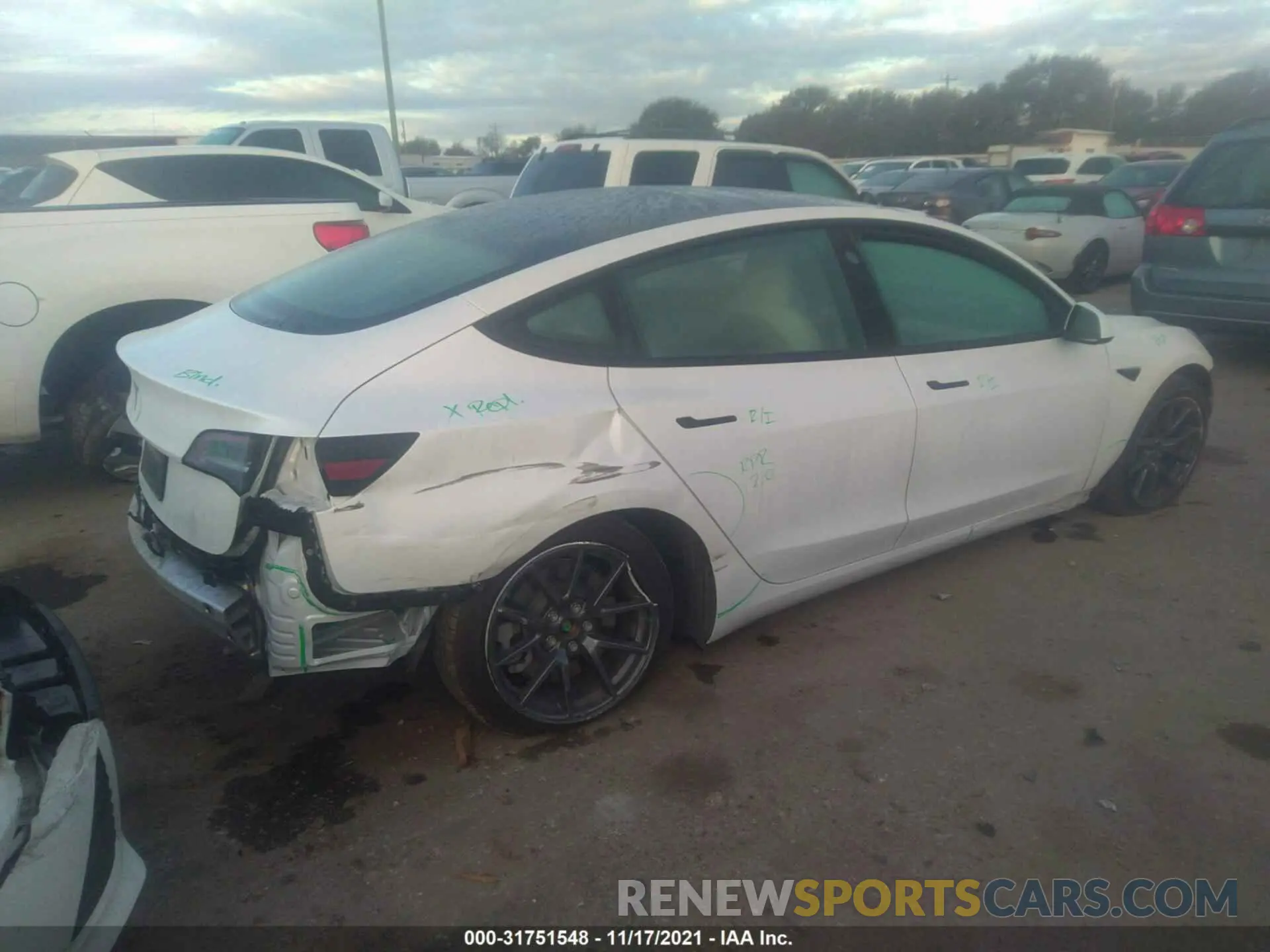 4 Photograph of a damaged car 5YJ3E1EA3MF921593 TESLA MODEL 3 2021