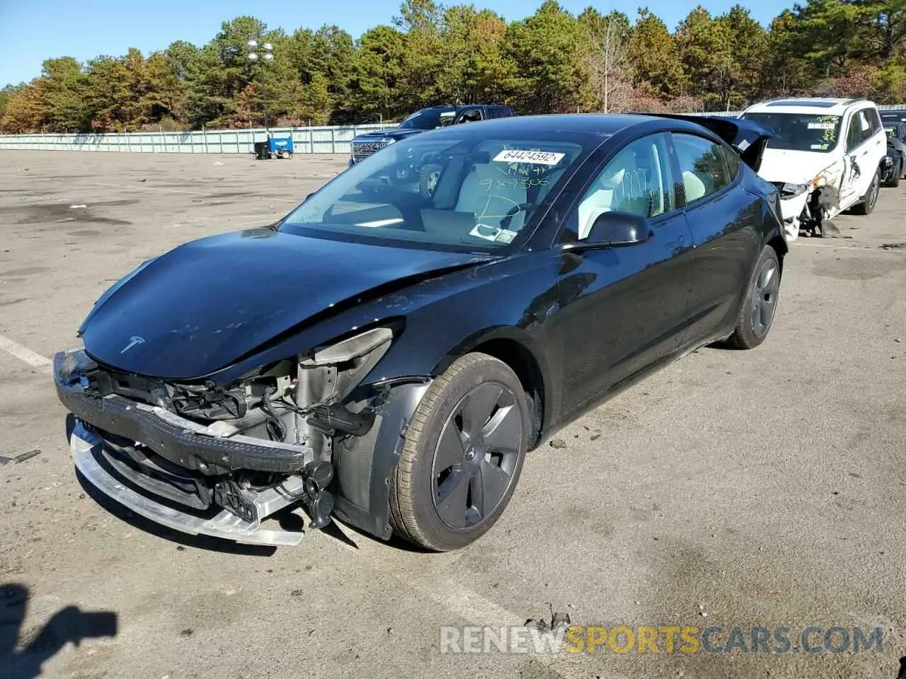 2 Photograph of a damaged car 5YJ3E1EA3MF989506 TESLA MODEL 3 2021
