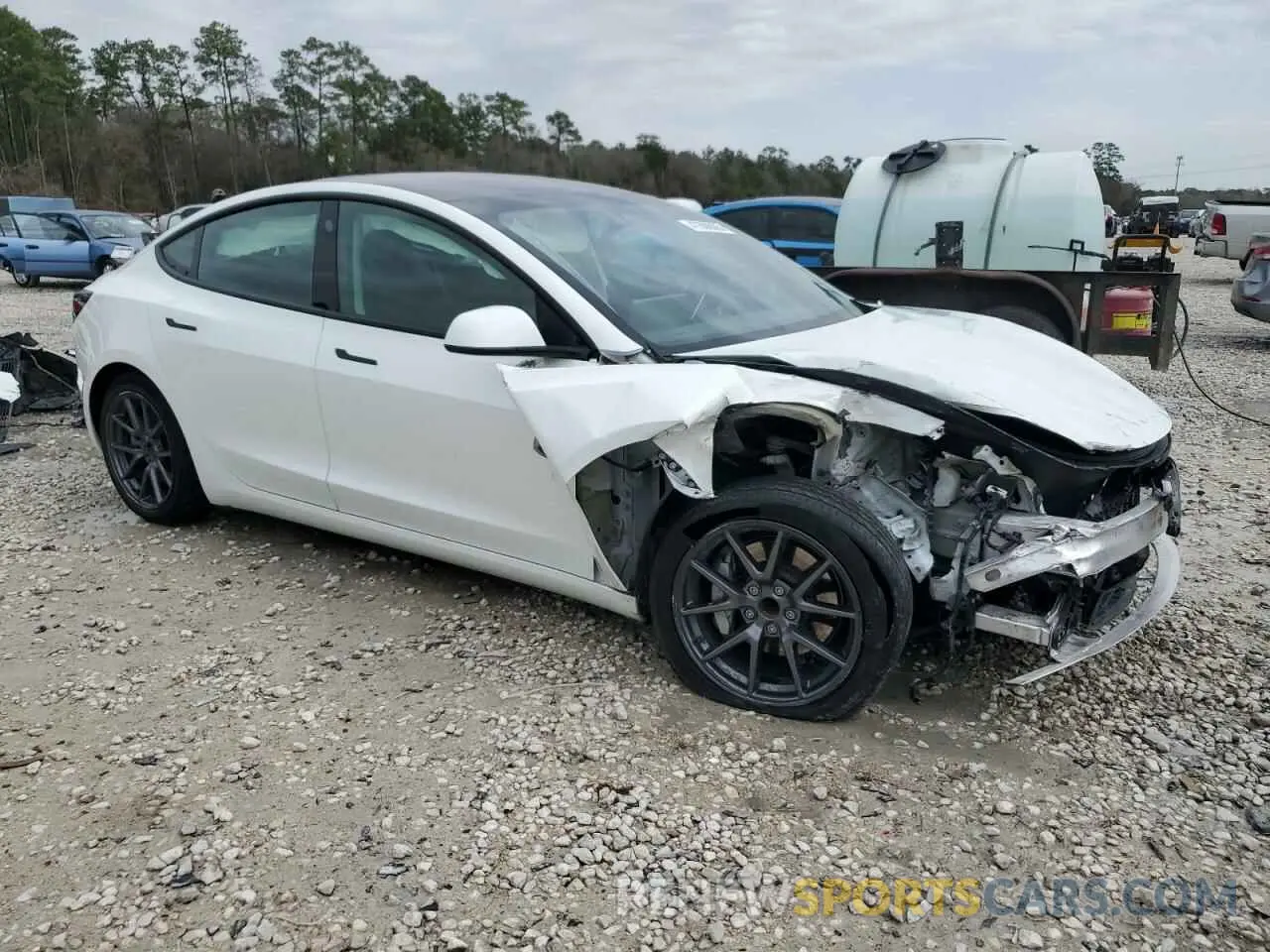 4 Photograph of a damaged car 5YJ3E1EA4MF100258 TESLA MODEL 3 2021