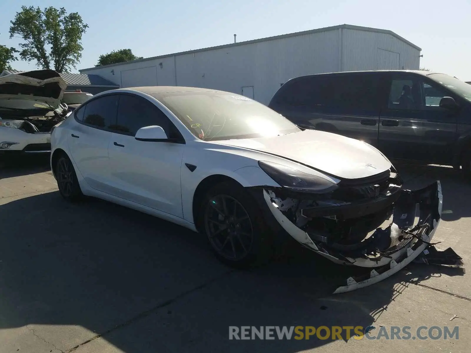 1 Photograph of a damaged car 5YJ3E1EA4MF873294 TESLA MODEL 3 2021