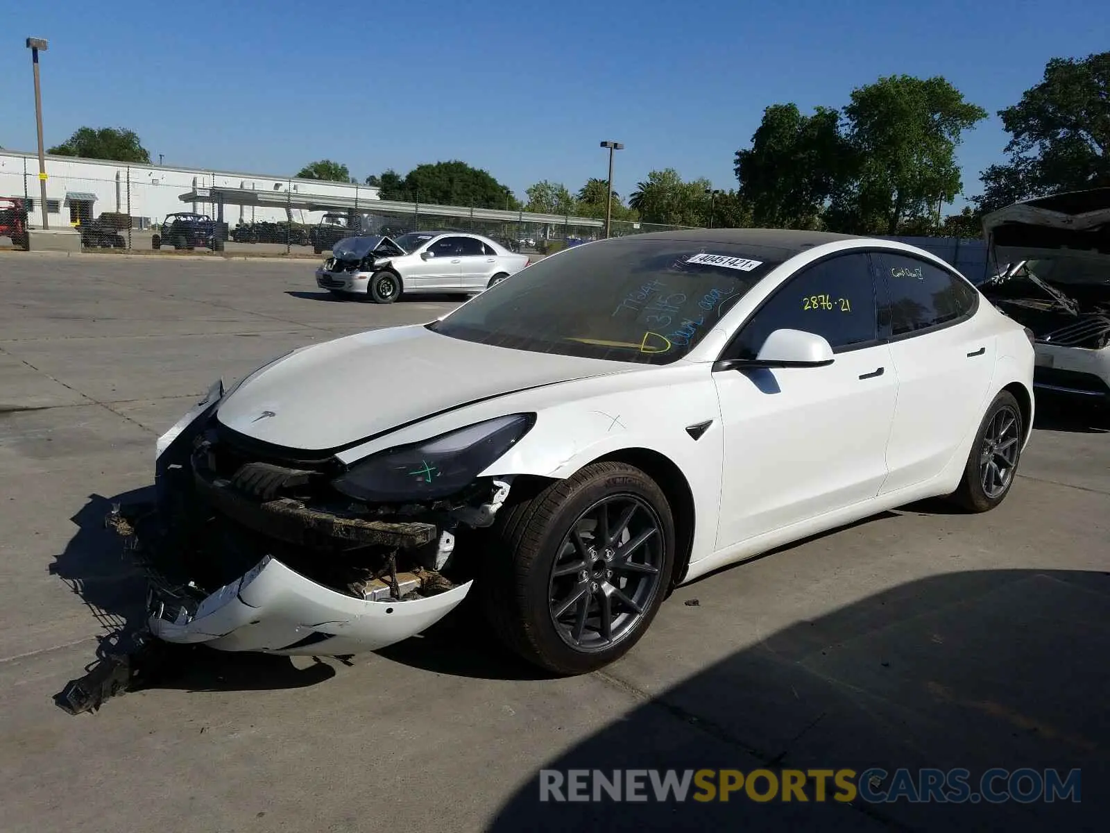 2 Photograph of a damaged car 5YJ3E1EA4MF873294 TESLA MODEL 3 2021