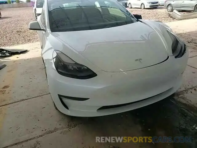 11 Фотография поврежденного автомобиля 5YJ3E1EA4MF911364 TESLA MODEL 3 2021