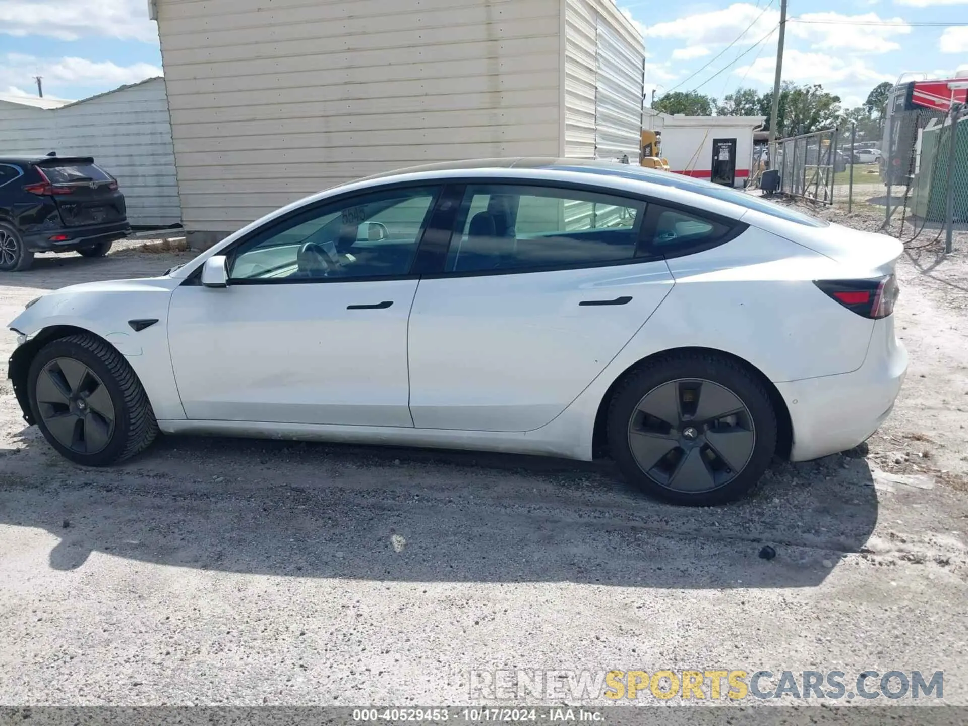 14 Photograph of a damaged car 5YJ3E1EA4MF915253 TESLA MODEL 3 2021
