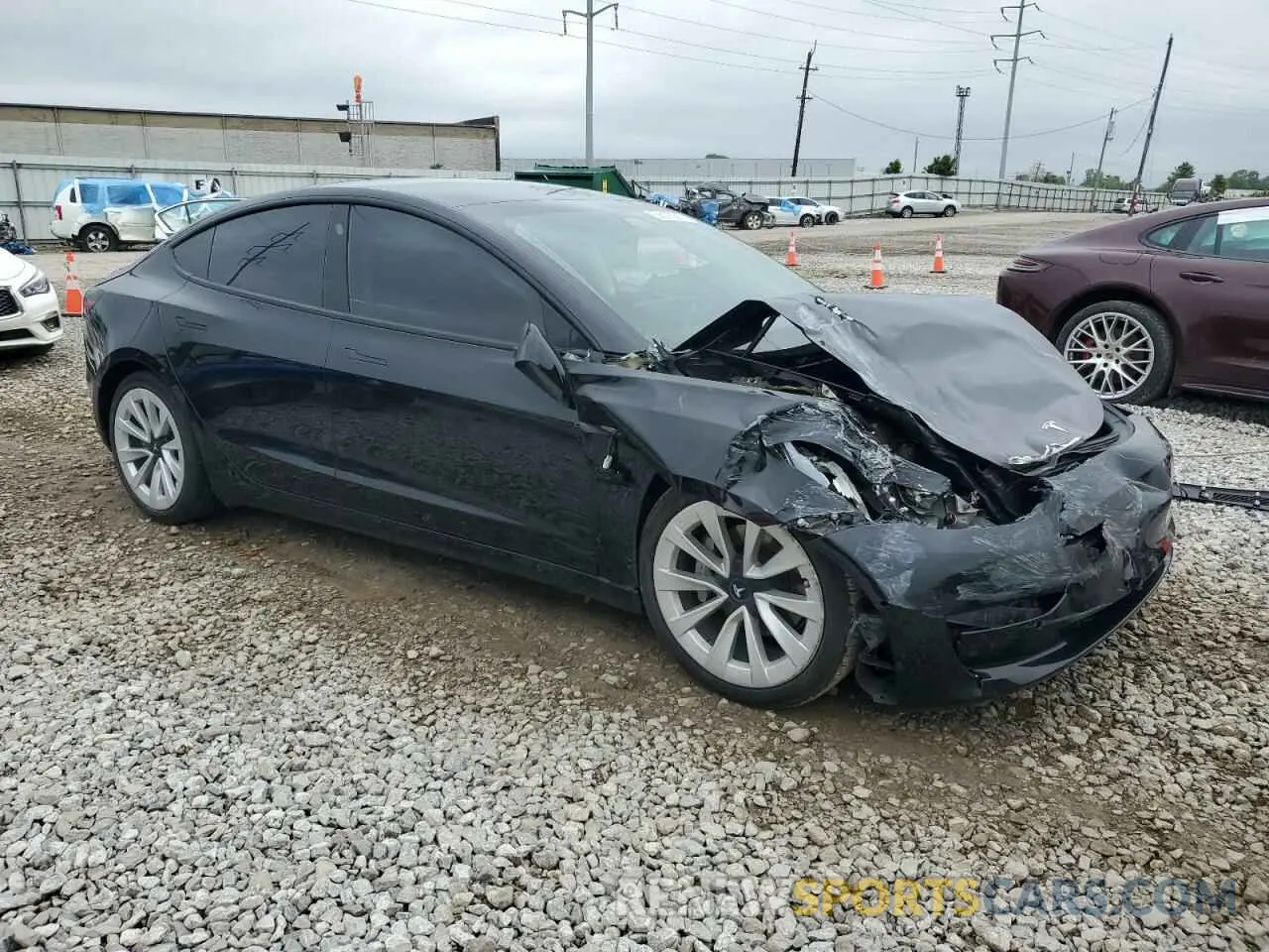 4 Photograph of a damaged car 5YJ3E1EA4MF917357 TESLA MODEL 3 2021