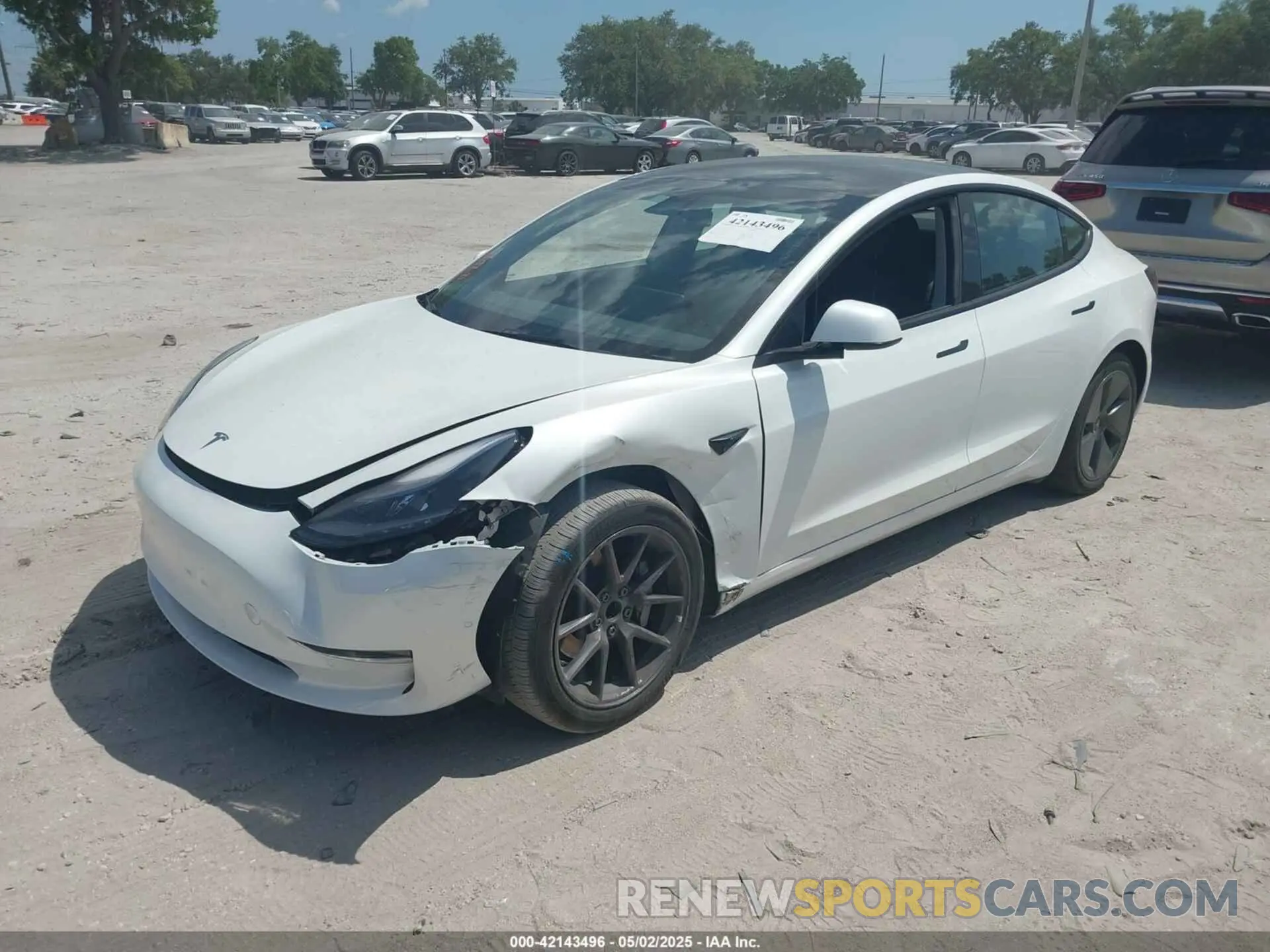 2 Photograph of a damaged car 5YJ3E1EA5MF098844 TESLA MODEL 3 2021