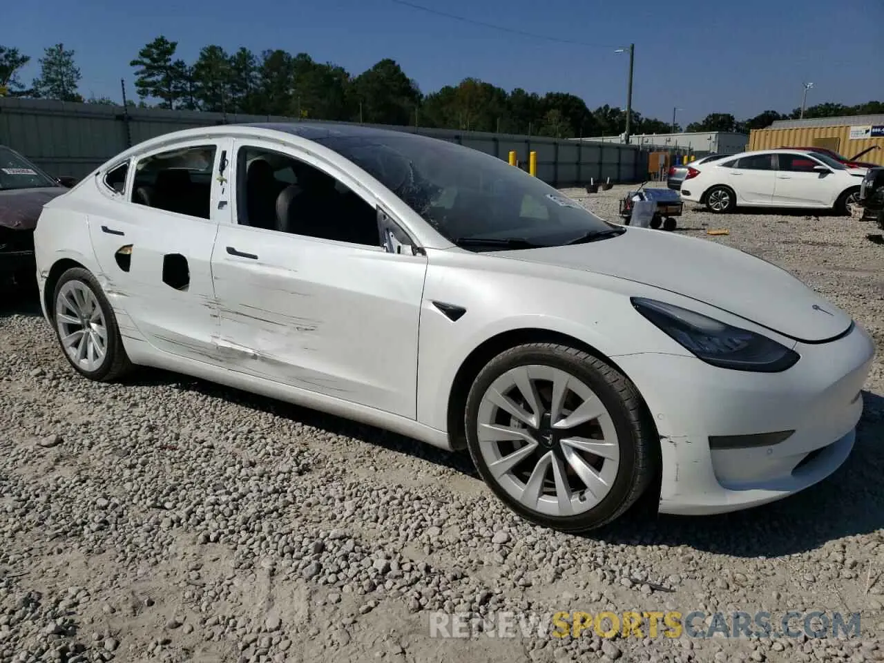 4 Photograph of a damaged car 5YJ3E1EA5MF849215 TESLA MODEL 3 2021