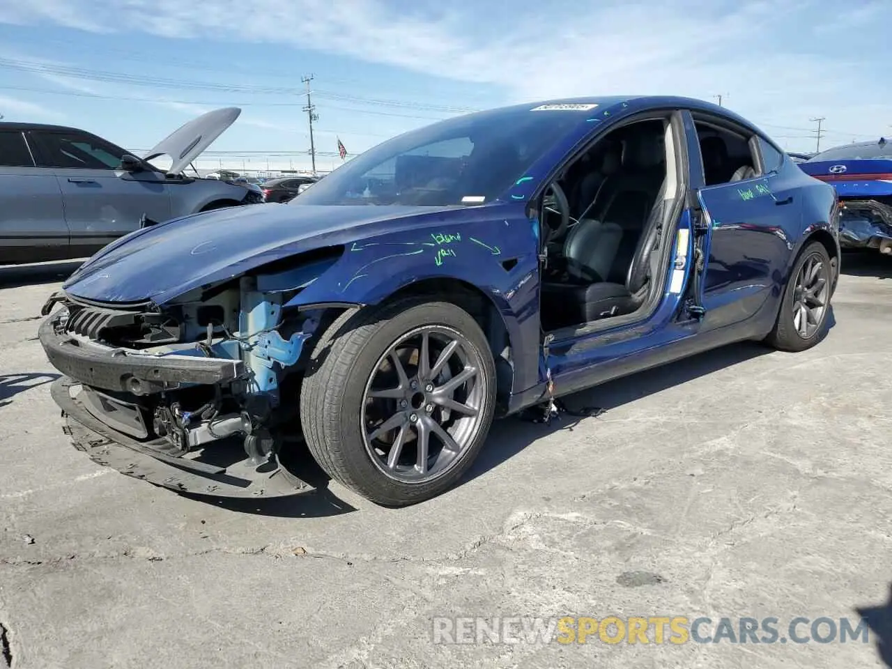 1 Photograph of a damaged car 5YJ3E1EA5MF876298 TESLA MODEL 3 2021