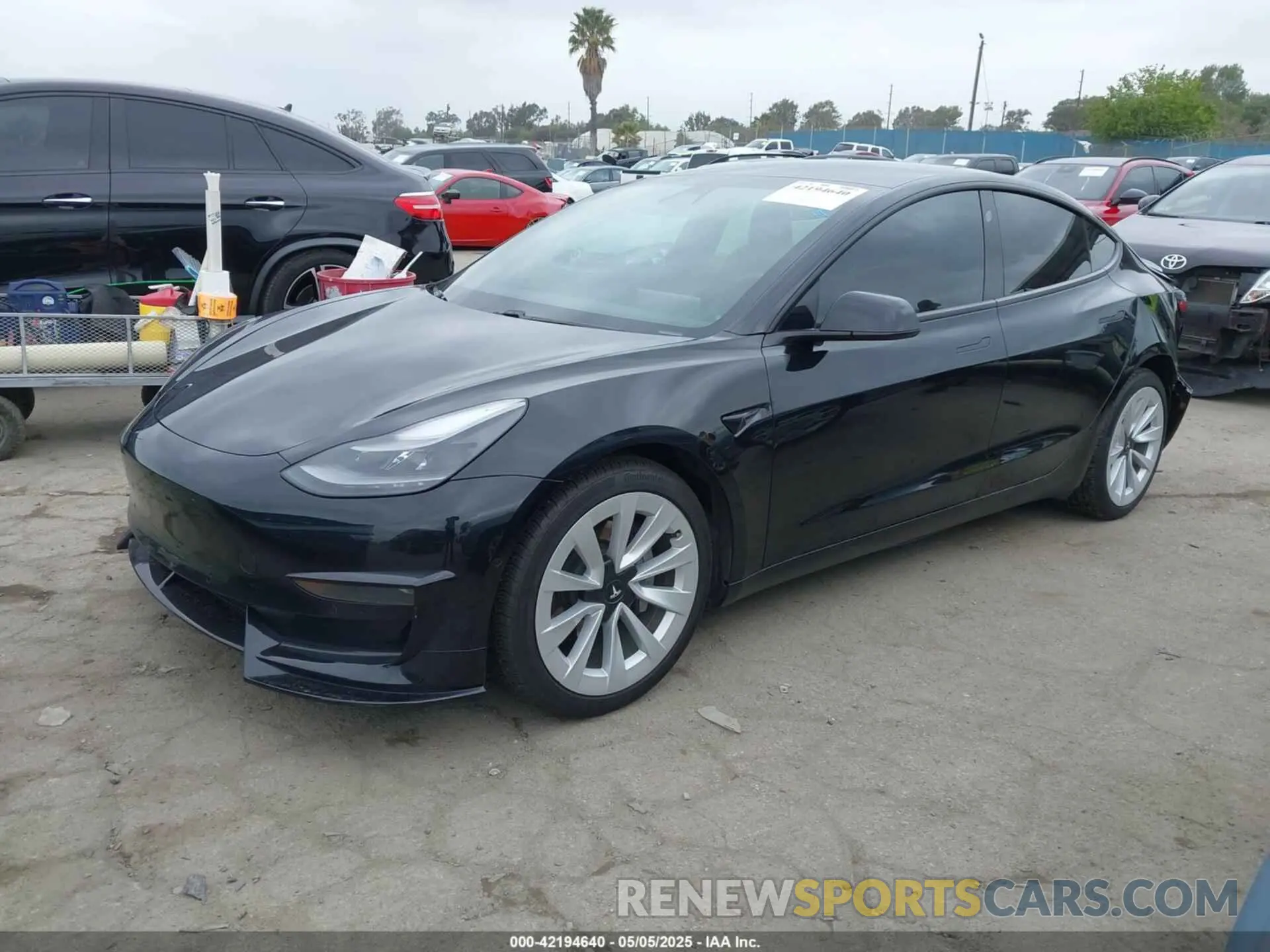 2 Photograph of a damaged car 5YJ3E1EA5MF938928 TESLA MODEL 3 2021