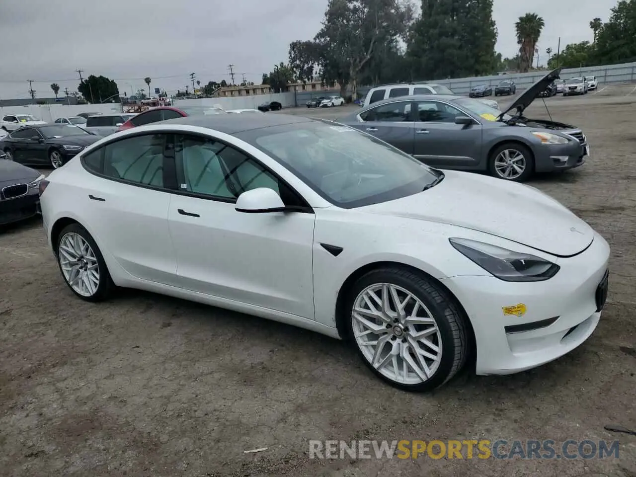 4 Photograph of a damaged car 5YJ3E1EA6MF025109 TESLA MODEL 3 2021