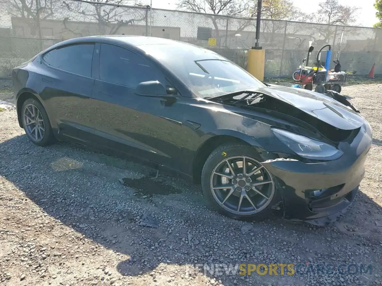 4 Фотография поврежденного автомобиля 5YJ3E1EA6MF067702 TESLA MODEL 3 2021